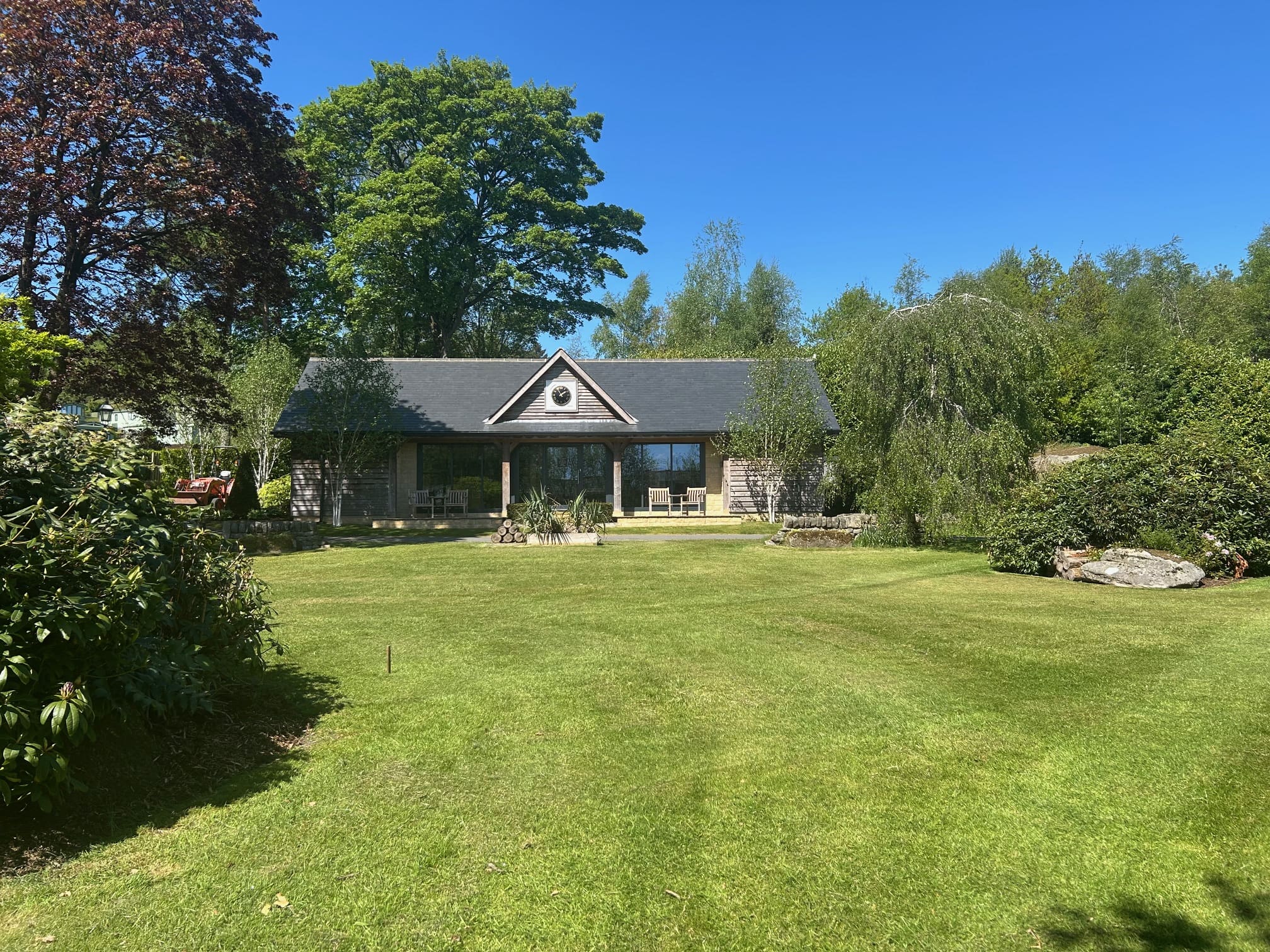 Rolling green hills, spring blossoms.