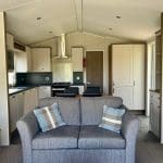Modern and cosy interior of a holiday lodge at Warren Forest Park