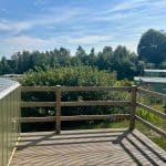 Decking area with a view of greenery at Warren Forest Park