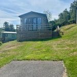 Spacious holiday lodge with a deck at Warren Forest Park