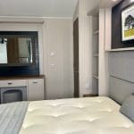 Charming bedroom in a holiday lodge at Warren Forest Park