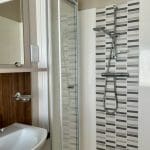 Modern shower room in a holiday lodge at Warren Forest Park