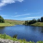 Grimwith Reservoir at Warren Forest Park on a sunny day