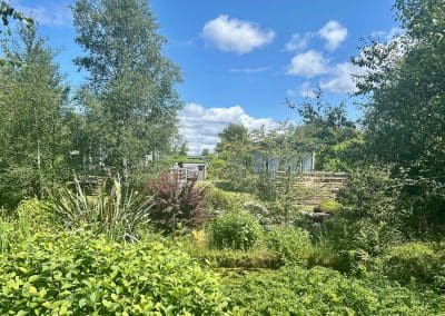 View of greenery and holiday homes at Warren Forest Park