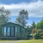 Holiday homes with a clear blue sky at Warren Forest Park